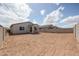 Home has a spacious backyard area with privacy wall that awaits your personal touch and landscaping at 39970 W Bravo Dr, Maricopa, AZ 85138