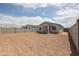 Spacious backyard area with privacy wall, ready for your personal touch and landscaping at 39970 W Bravo Dr, Maricopa, AZ 85138