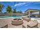 Outdoor space with pool, BBQ area, fire pit, and string lights, perfect for entertaining at 4115 S 75Th Dr, Phoenix, AZ 85043