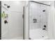 Bright and modern bathroom featuring white tiles in the tub and shower combination at 4115 S 75Th Dr, Phoenix, AZ 85043