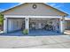 A three car garage with high ceilings provides ample storage space and room for a workshop at 4115 S 75Th Dr, Phoenix, AZ 85043