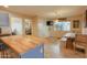 Spacious kitchen with custom island and wood table, offering great prep and dining space at 4238 W Krall St, Phoenix, AZ 85019