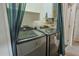 Laundry room featuring a Samsung washer and dryer at 4238 W Krall St, Phoenix, AZ 85019