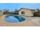 Beautiful backyard pool surrounded by a concrete deck, perfect for outdoor relaxation and entertainment at 4238 W Krall St, Phoenix, AZ 85019