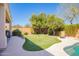 Backyard featuring pool and an artificial putting green at 45140 W Zion Rd, Maricopa, AZ 85139