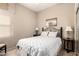 Inviting bedroom with neutral walls, carpet, and decorative lighting at 45140 W Zion Rd, Maricopa, AZ 85139