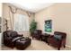 Comfortable living room area featuring a cozy seating arrangement at 45140 W Zion Rd, Maricopa, AZ 85139