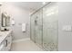 Modern bathroom showcasing glass shower doors and stylish fixtures at 5250 E Deer Valley Dr # 243, Phoenix, AZ 85054