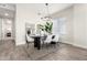 Bright dining room features modern lighting, stylish mirrors, and a sleek table set at 5250 E Deer Valley Dr # 243, Phoenix, AZ 85054