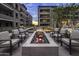 Cozy fire pit surrounded by comfortable seating, perfect for evening gatherings and relaxation at 5250 E Deer Valley Dr # 243, Phoenix, AZ 85054