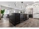 Large kitchen island featuring stainless steel appliances and a built-in beverage cooler at 5250 E Deer Valley Dr # 243, Phoenix, AZ 85054