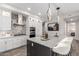 Well-lit kitchen with modern cabinetry, stainless steel appliances and a large island at 5250 E Deer Valley Dr # 243, Phoenix, AZ 85054