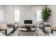 Bright living room with a modern fireplace and stylish furniture arrangement at 5250 E Deer Valley Dr # 243, Phoenix, AZ 85054