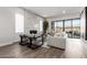 Inviting living room with a fireplace, comfortable seating, and sliding glass doors at 5250 E Deer Valley Dr # 243, Phoenix, AZ 85054
