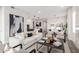 Spacious living room open layout featuring stylish decor and contemporary lighting at 5250 E Deer Valley Dr # 243, Phoenix, AZ 85054