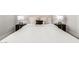 Comfortable main bedroom featuring a plush bed, stylish side tables, and warm lighting at 5250 E Deer Valley Dr # 243, Phoenix, AZ 85054