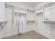 Spacious walk-in closet with custom shelving and ample storage space at 5250 E Deer Valley Dr # 243, Phoenix, AZ 85054
