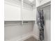 Spacious walk-in closet featuring ample shelving and clothing racks at 5250 E Deer Valley Dr # 243, Phoenix, AZ 85054