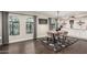 Open dining area with views to the backyard, features a modern table set and plenty of natural light at 5642 E Justine Rd, Scottsdale, AZ 85254