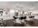 Spacious kitchen with granite countertops, a stainless steel fridge, and open to the dining area at 5642 E Justine Rd, Scottsdale, AZ 85254