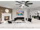 Inviting living room boasts a cozy fireplace, stylish furniture, and open layout at 5642 E Justine Rd, Scottsdale, AZ 85254