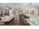 Spacious open living area with bar seating that connects the living area to the kitchen at 5642 E Justine Rd, Scottsdale, AZ 85254