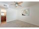 Neutral bedroom featuring neutral carpet and view to bathroom at 5877 N Granite Reef Rd # 1155, Scottsdale, AZ 85250