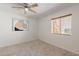 Neutral bedroom with carpet, ceiling fan, and window with blinds at 5877 N Granite Reef Rd # 1155, Scottsdale, AZ 85250