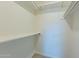 White walk-in closet with shelving for ample storage at 5877 N Granite Reef Rd # 1155, Scottsdale, AZ 85250