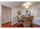 Dining space with decorative mirror, artwork, and dining table with seating at 5877 N Granite Reef Rd # 1155, Scottsdale, AZ 85250