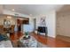 Open-concept living room and kitchen area with hardwood floors, modern decor, and abundant natural light at 5877 N Granite Reef Rd # 1155, Scottsdale, AZ 85250