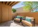 Inviting covered patio with comfortable seating and desert landscaping at 5877 N Granite Reef Rd # 1155, Scottsdale, AZ 85250