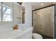 Stylishly remodeled bathroom showcasing a glass shower and granite countertops at 7507 E Beatrice St, Scottsdale, AZ 85257