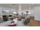 Stylishly furnished open-concept living space with a view of the dining and kitchen areas at 7507 E Beatrice St, Scottsdale, AZ 85257