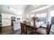 Bright kitchen with white cabinets, modern appliances, and adjacent dining area, perfect for gatherings at 843 W Palo Verde St, Gilbert, AZ 85233