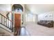 Bright living room featuring an arched entryway, soaring ceilings, and lots of natural light at 843 W Palo Verde St, Gilbert, AZ 85233