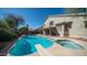 Backyard swimming pool and spa with diving board and patio at 843 W Palo Verde St, Gilbert, AZ 85233
