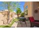 Inviting backyard patio with outdoor seating, lush greenery, and a well-maintained landscape at 9070 E Gary Rd # 136, Scottsdale, AZ 85260