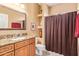 Bathroom featuring a vanity with granite countertop, patterned shower curtain and light fixtures at 9070 E Gary Rd # 136, Scottsdale, AZ 85260