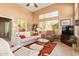 Bright living room featuring large windows, comfortable seating, and natural light at 9070 E Gary Rd # 136, Scottsdale, AZ 85260
