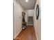 Inviting entryway featuring hardwood floors, coat rack and staircase at 927 W Wendy Way, Gilbert, AZ 85233