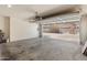 Spacious garage with an open door, offering plenty of room for storage at 927 W Wendy Way, Gilbert, AZ 85233