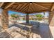 Community pool area under a covered pavilion with picnic tables and lounge chairs at 927 W Wendy Way, Gilbert, AZ 85233