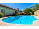 A refreshing pool is surrounded by lush landscaping at 930 E Citation Ln, Tempe, AZ 85284