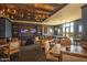 Relaxing clubhouse with a pool table, multiple seating areas, and televisions for entertainment and socializing at 12733 S 177Th Ln, Goodyear, AZ 85338