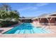 Lap pool with lane markers surrounded by a building structure at 12733 S 177Th Ln, Goodyear, AZ 85338