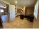 Home office offers built-in shelving and a large window with ample space for a desk at 19322 E Calle De Flores --, Queen Creek, AZ 85142