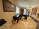 Comfortable office featuring tile floors, a large desk and a bright window for natural light at 19322 E Calle De Flores --, Queen Creek, AZ 85142