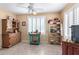 Bright and spacious dining room with a ceiling fan and rustic decor at 10322 E Excavation Ct, Gold Canyon, AZ 85118
