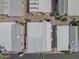 Birds eye view of the residence, showcasing a well maintained roof, driveway and surrounding structures at 111 S Greenfield Rd # 313, Mesa, AZ 85206
